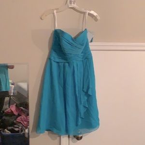 Ocean blue David’s bridal dress